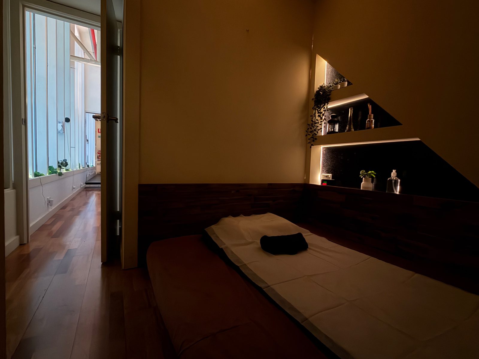 Warmly lit private treatment room at The M Studio Melbourne CBD
