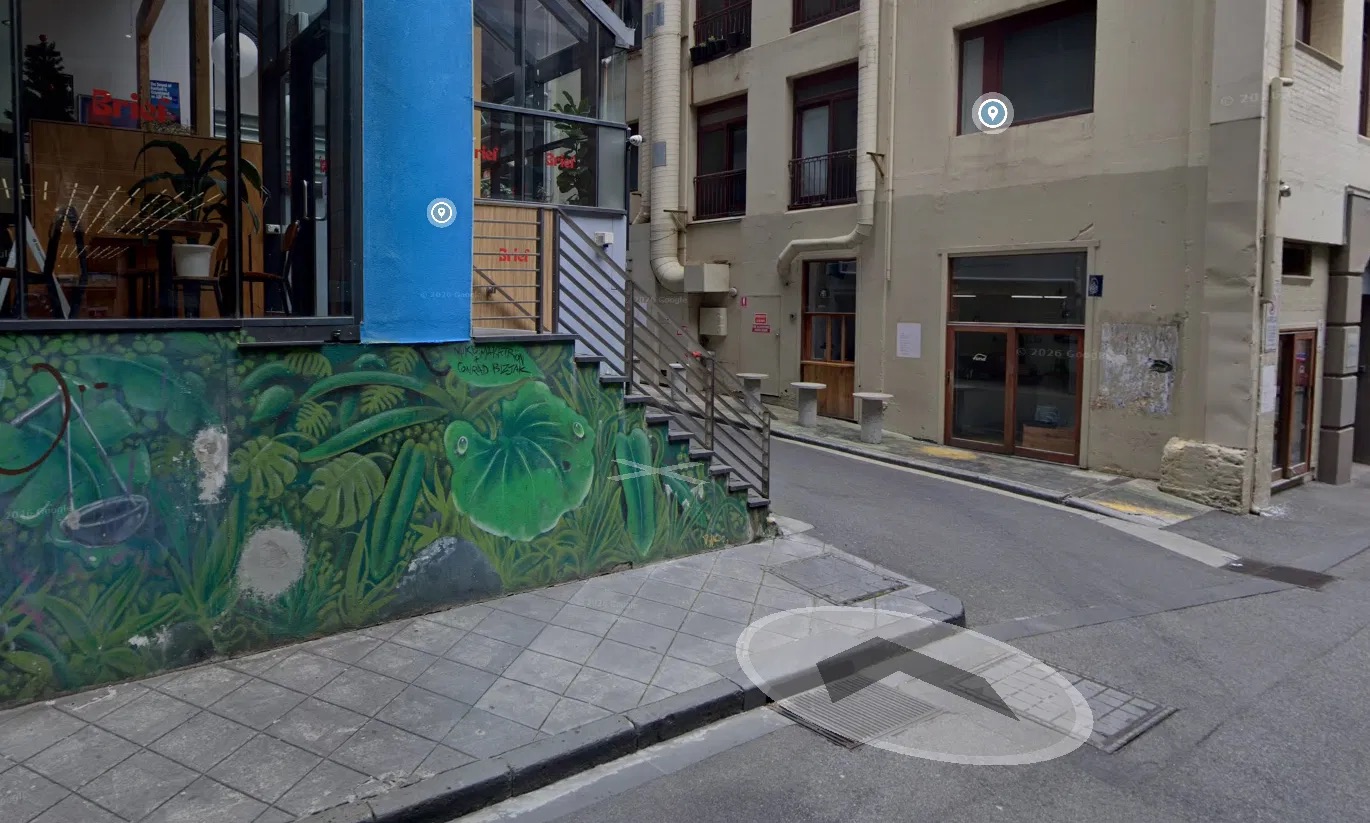 The right turn beside the mural