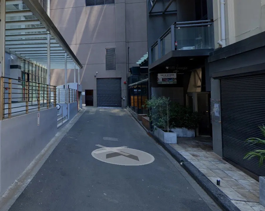 The M Studio sign and entrance in the laneway